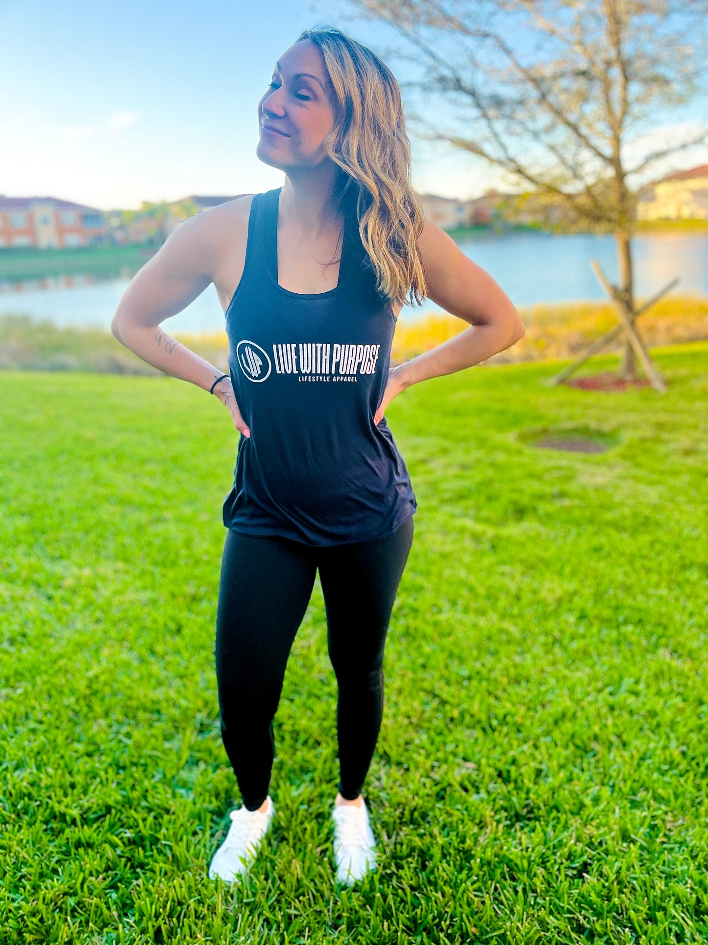 WOMEN’S MIDNIGHT FLOWY RACERBACK TANK