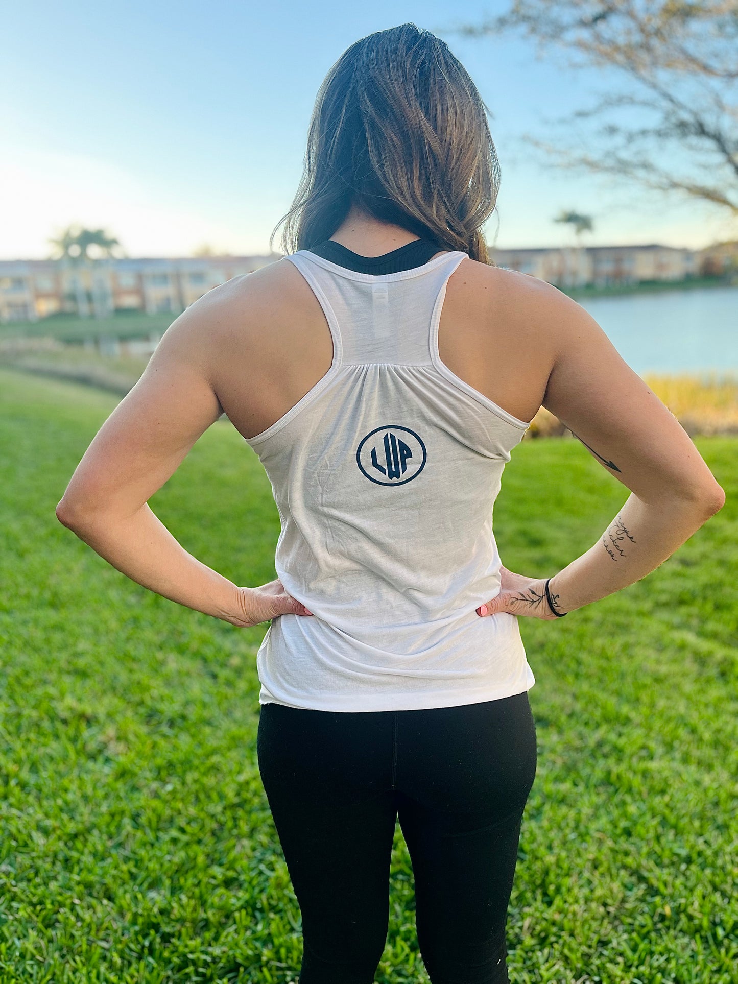 WOMEN’S WHITE FLOWY RACERBACK TANK